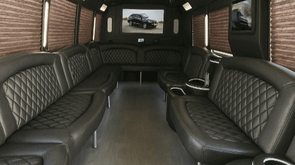 lansing 50 passenger party bus rental